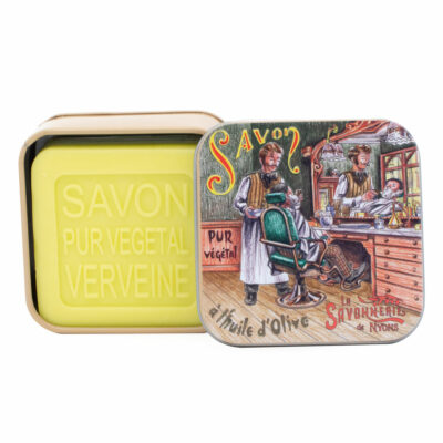 Savon de 100g dans une boite en métal retro illustrée avec un barbier de la collection de savons parfumés "Savons des Métiers"